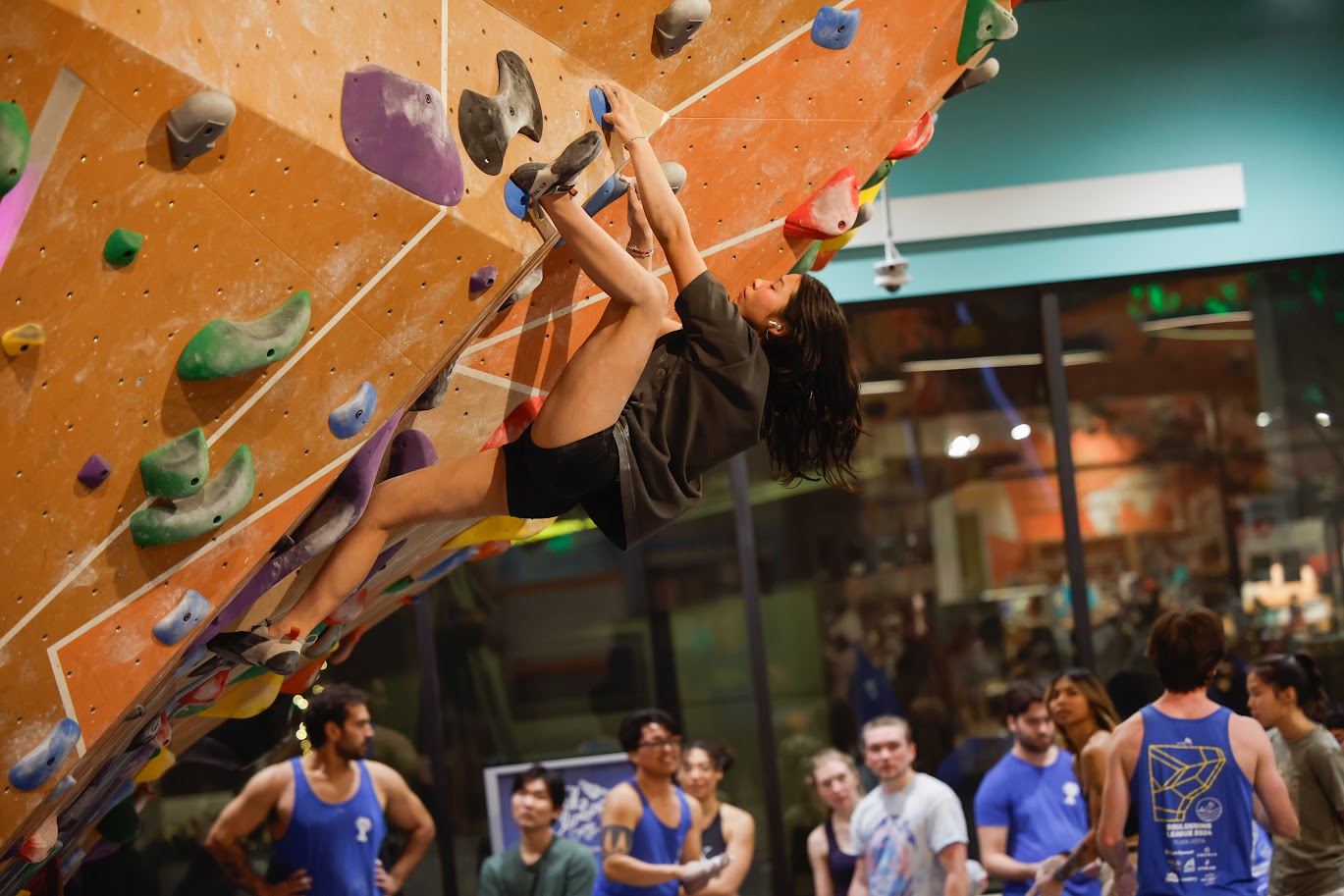 Climber on bouldering wall